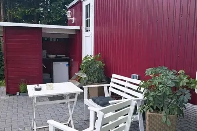 Image de Idyllische Übernachtung im Bauwagen mit Outdoordusche und Outdoorküche