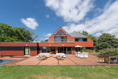 Image de Maison d'hôtes 'Chambre D'hôtes - Ty Castel' avec piscine partagée, jardin partagé et Wi-Fi