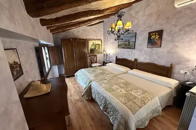 Image de Chambre 'Suite Las Golondrinas' avec vue sur la montagne, Wi-Fi et climatisation