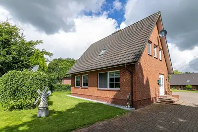 Image de Maison de vacances 'Ferienhaus Magda - Stadum' avec terrasse privée, jardin privé et Wi-Fi
