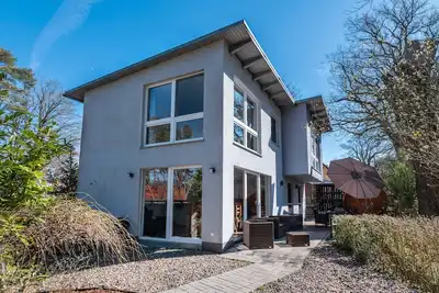 Image de Maison de vacances 'Ferienhaus Traum Am See Mit Sauna' avec vue sur lac, terrasse privée et Wi-Fi