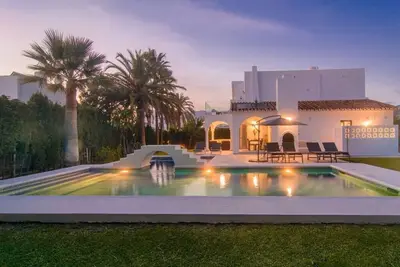 Image de Jardin avec piscine sur la plage