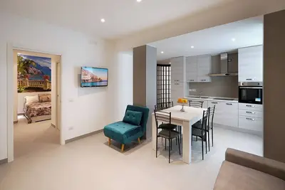Image de Elegante Appartamento, Ideale per Famiglie, sul Corso Principale Della Città