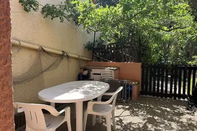 Image de Charmant T3 climatisé en Rdc, terrasse fleurie, idéal famille, 6p, proche plage, parking inclus