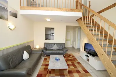 Image de You live directly on the beach, comfortably on 2 spacious floors.