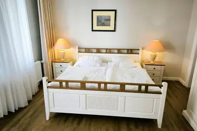 Image de 01 Schöne 2-raum-ferienwohnung mit Terrasse - Ruhig Gelegenes Appartementhaus mit Ferienwohnungen