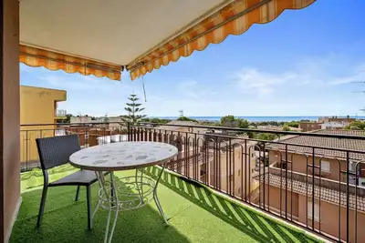 Image de Appartement 'Apartamento Segur Calafell' avec vue sur la mer, piscine partagée et terrasse privée