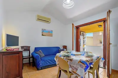 Image de Maison de vacances 'Casa Vacanza Olbia Mare' avec vue sur la mer, jardin partagé et climatisation