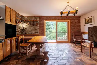 Image de Chalet 'Maison Du Cloz' avec vue sur montagne et balcon