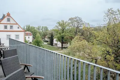 Image de Ferienwohnung Flussnixe - Ferienwohnungen in der Wassermühle am Schloss