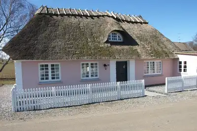 Image de Charming thatched-roff house with two.