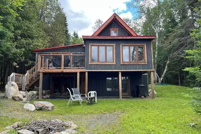 Image de Chalet rustique au bord du lac, kayak