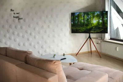 Image de Comfortable lodge by the lake with a tile stove and a terrace with valley view