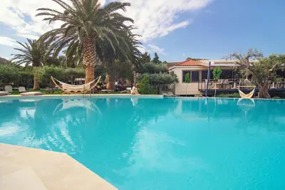 Superb Agios Vasilios Suite | Lolopechka Suite | 1 Bedroom | Min. Children Age: 13 Years | Private Furnished Balcony or Terrace with Garden and Mountain View | Spacious Shared Furnished Sun Terrace | Shared Outdoor Pool | Shared Hot Tub | Agia Galini