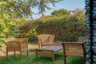 Image de Maison de vacances 'Maison Chaleureuse Cancale' avec terrasse privée et jardin privé