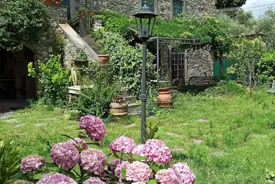 Old farmhouse with romantic garden in medieval setting, near the 5Terre.
