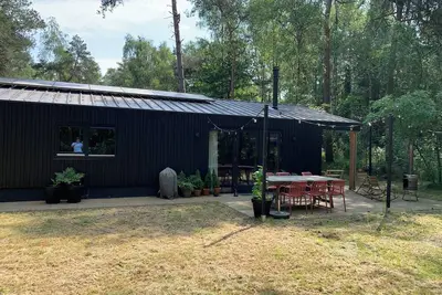 Image de Heerlijk Familiehuis in het Bos. Geniet van Rust en het bos in dit Natuurhuisje