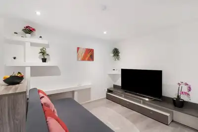 Image de Appartement 'Hochwertige Ferienwohnung Ötigheim' avec jardin partagé, Wi-Fi et climatisation
