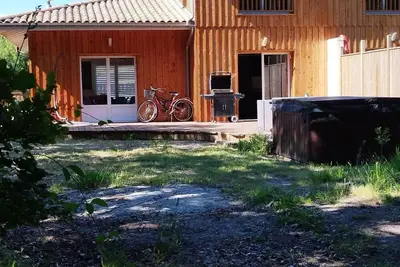 Image de Jolie maison neuve en lisière de forêt avec son Spa privé, à 7 min de la plage!
