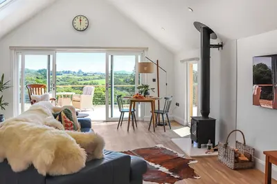 Image de A luxury cottage with private Hot Tub and stunning countryside views.