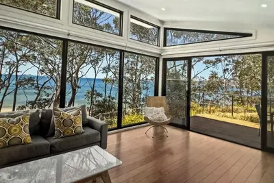 Image de Karana Beach House - a serene coastal haven just a 2-minute walk from the beach.