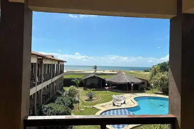 Image de Apê em Residencial com Piscina e em Frente pro Mar, a 100 m da Praia!