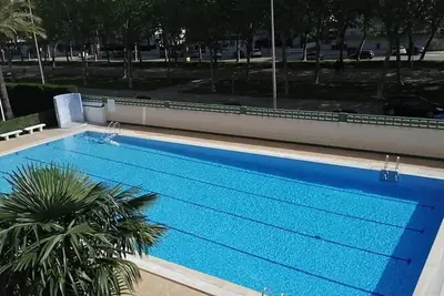 Image de Appartement 'Alquilar Mas Comprar - Tere 2' avec piscine partagée, jardin privé et balcon