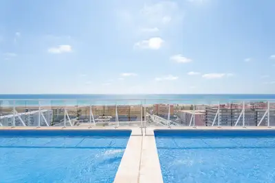 Image de Appartement 'Lopimar playa Canet' avec piscine partagée, Wi-Fi et climatisation