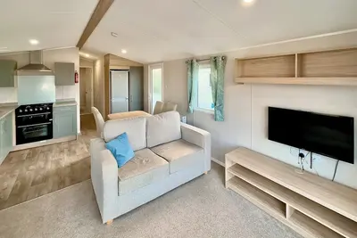 Image de This 3-Bedroom Deluxe Holiday Home is perfect for families of up to six.