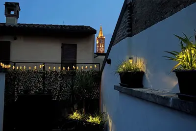 Image de Apartment with a terrace among the rooftops of an old building.
