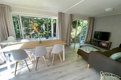 Image de Veluwe Vakanties Chalet With Private Garden and Sauna - Community Swimming Pool