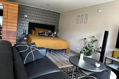 Image de L'Entre 2-Suite de charme avec sauna et baignoire à bulles et à jets