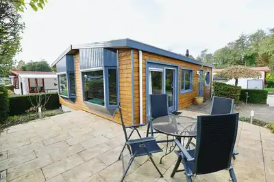 Image de Cozy Chalet at Holiday Park De IJsvogel: Relaxation in the Veluwe Nature