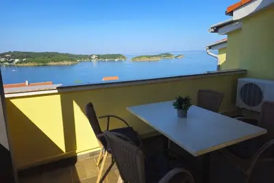 Image de Appartement d'une chambre avec la terrasse et la vue sur le mer Supetarska Draga - Gornja, Rab (A-13645-d)