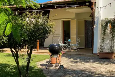 Image de Maison de vacances 'Villa Nel Parco Naturale Di Ugento' avec jardin privé et climatisation