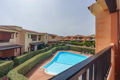 Image de Appartement 'Casa Vacanze Melone' avec piscine partagée, terrasse privée et balcon