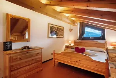 Image de Appartement 'Mansarda Elois' avec vue sur les montagnes, terrasse partagée et Wi-Fi