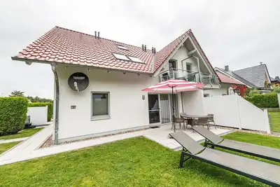 Image de Appartement 'Domizil Eden - Erdgeschoss' avec terrasse privée, jardin privé et Wi-Fi