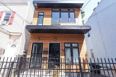 Image de Cozy 3-bedroom apartment in the city of  Newark with WiFi, Ac