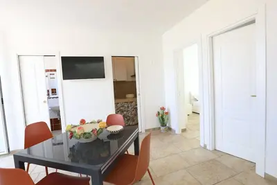 Image de Condominium-Salle de bain privée séparée-Appartement-Patio-Appartamento Piano 3
