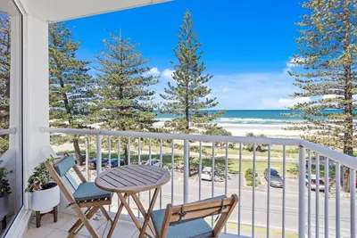 Image de Discover coastal relaxation with this beachfront apartment.