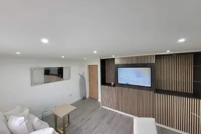 Image de A comfortable and modern apartment complex with a warm and homely feeling.
