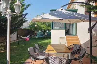 Image de Maison 5 chambres (dont 2 ch. parentales) avec jardin