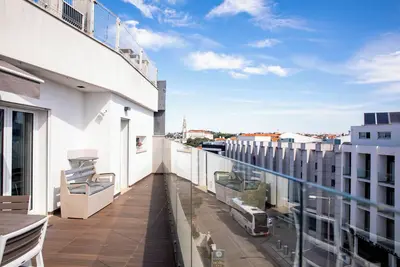Image de Cozy apartment - top floor views, in the center of Fátima!
