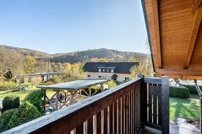 Image de Appartement 'Blockhaus - Ferienwohnung Sunrise' avec jardin partagé, balcon et Wi-Fi