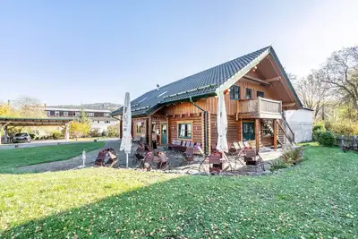 Image de Appartement 'Blockhaus - Ferienwohnung Sunset' avec jardin partagé, balcon et Wi-Fi
