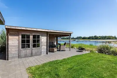 Image de Maison de vacances 'Ferienhaus Am See' avec vue sur lac, terrasse privée et Wi-Fi