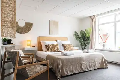 Image de Lits boxspring dans une chambre en bord de mer où vous pouvez également emmener un enfant, avec un c