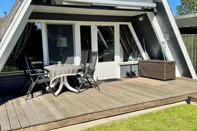 Image de Zeltdachhaus Mühlenblick Damp, Kamin, Sauna, Umzäunter Garten, Hunde, 6pers