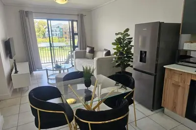 Image de Cozy 2-bedroom apartment in phenomenal Sandton with WiFi, fitness room